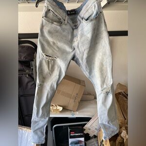 RSQ Jeans slim taper 34x30 stretchy stained and distressed
